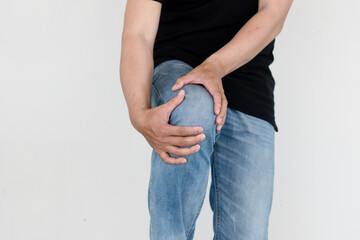 Knee pain Men suffering from knee pain from sweating or overexertion , Medical and healthcare concept.