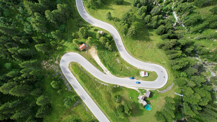 Serpentine road in the forest view from above.