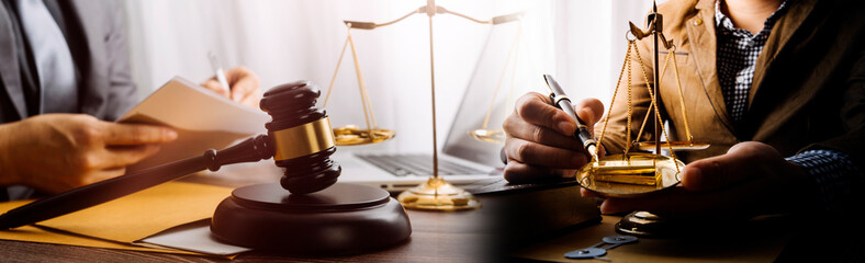 Business and lawyers discussing contract papers with brass scale on desk in office. Law, legal...