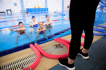 Aqua aerobics training in the water sports center.