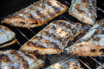 Sword fish grilled over charcoal.