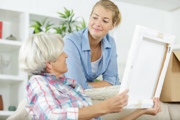 senior mum talks to younger daughter