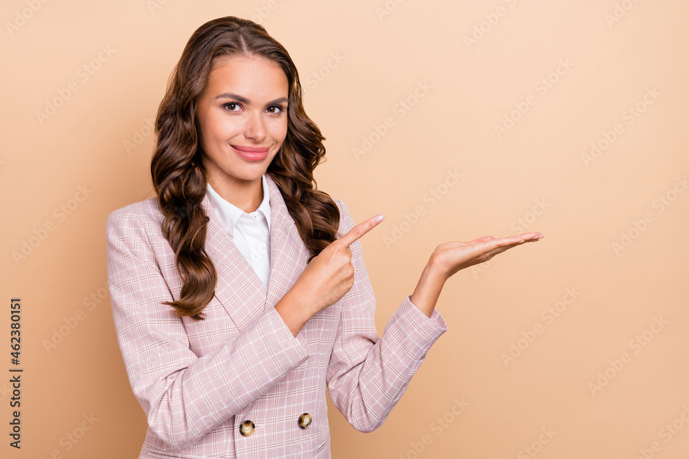 Canvas Prints Photo of positive adorable person finger direct hand palm hold empty space isolated on beige color background