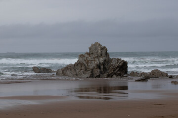 Fototapeta na wymiar rocks on Sopelana beach, near Bilbao.