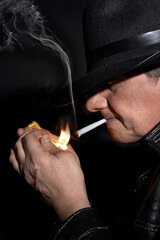 Fototapeta premium Lighting a smoke