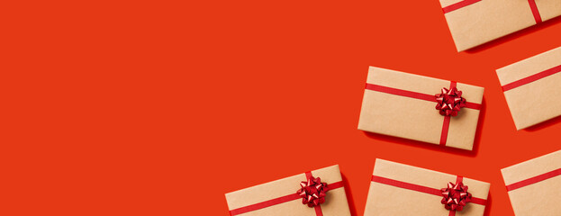 Holiday gifts and presents concept web banner with copy space. Overhead view of gift boxes wrapped...