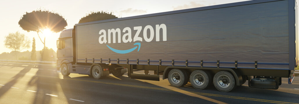 Guilherand-Granges, France - October 12, 2021. Truck on road with Amazon Logistics logo. Last-mile delivery and shipping service that gets orders to Amazon customers. 3D rendering.