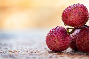 fruit lychee branch with fruits on the background