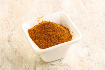 Dry Paprika powder in the bowl