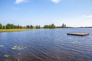 Lake Onega with the Church of the Transfiguration of the Lord. Kizhi Island. Republic of Karelia. Russia