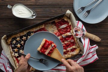 Traditional American Independence Day or Labor Day Strawberry Pie in the Shape of a Flag, Top View - obrazy, fototapety, plakaty