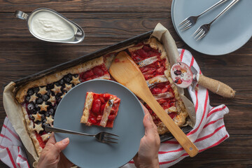 Traditional American Independence Day or Labor Day Strawberry Pie in the Shape of a Flag, Top View - obrazy, fototapety, plakaty