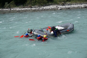 white river rafting accident everybody in the water trying to climb back up raft in durance river alps france - obrazy, fototapety, plakaty