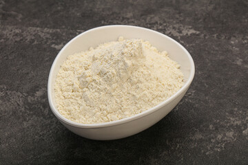 Wheat flour heap in the bowl