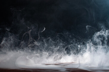 Abstract smoke on a dark background .