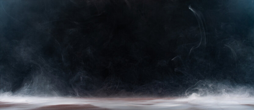 Abstract smoke on a dark background .
