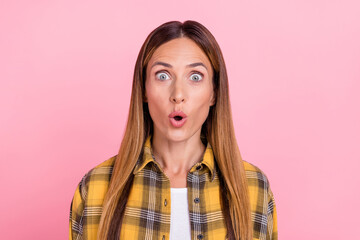 Photo of shocked amazed young woman news sale face reaction unbelievable isolated on pastel pink...