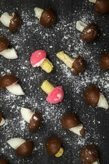 Top view of sweet mushrooms lying on a wooden table