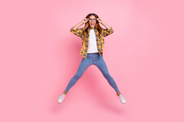 Full length portrait of energetic astonished lady hands touch eyewear isolated on pink color background