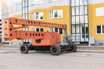 Construction telescopic tower or work platform for people to work at height. Powerful work platform for lifting construction workers up.