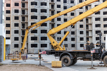 Construction telescopic tower or work platform for people to work at height. Powerful work platform for lifting construction workers up.