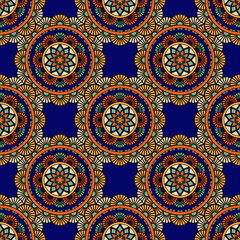 Abstract seamless mandala background. Texture in blue and red colors. Oriental pattern for design, fashion print, scrapbooking