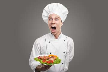 Comic chef with steak on plate