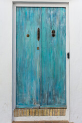 Turquoise door in the Jewish quarter of Vejer de la Frontera. Cadiz, Andalusia, Spain