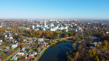 Fototapeta premium Sergiev Posad, Russia - 08 October 2021: Autumn view of the Holy Trinity Lavra of St. Sergius from a bird's eye view