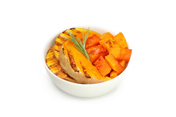 Bowl with baked pumpkin isolated on white background