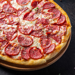 Pizza salami fast food pepperoni sausage, cheese, tomato sauce, dough fresh meal snack on the table copy space food background rustic 