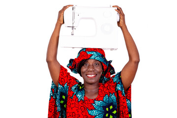 portrait of a seamstress wearing a sewing machine, smiling.