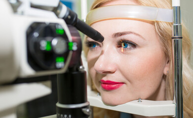 The patient passes an ophthalmologic examination, the doctor checks the health of the eyes and...