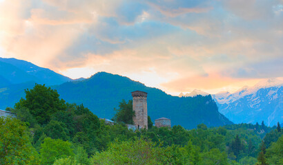 Mountain village with ancient towers at dusk - Mestia, Svaneti, Georgia
