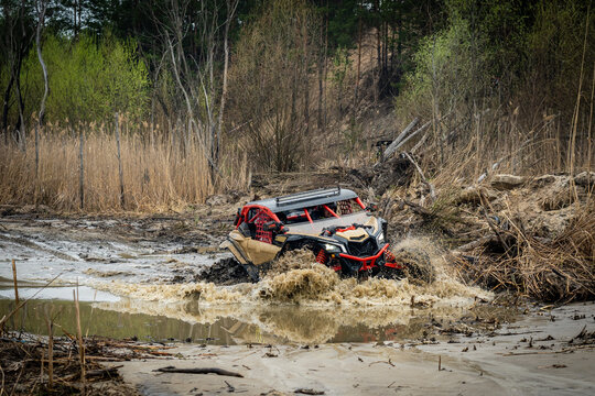 ATV/UTV/4x4 driving in muddy water