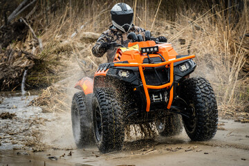 ATV/UTV/4x4 driving in muddy water