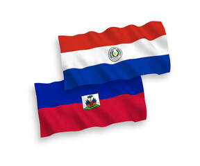 Flags of Republic of Haiti and Paraguay on a white background