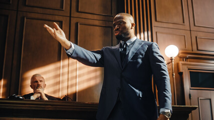Court of Justice and Law Trial: Successful Male Public Defender Presenting the Case, Making...