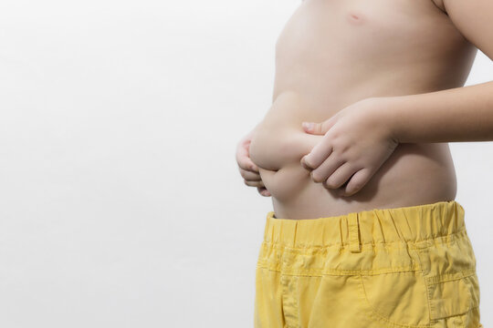 Obese fat Asian boy overweight on white background, Health care concept