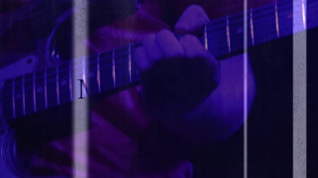 Animation of mega sale text over person playing guitar