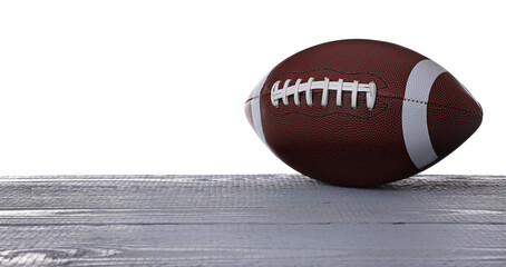 American football ball on grey wooden table against white background. Space for text