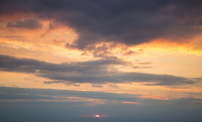 beautiful sunset on dramatic stormy red sky