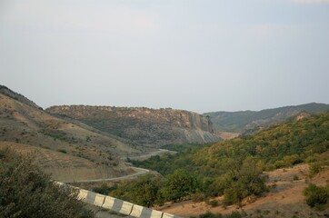 Obraz premium The road between the mountains serpentine, travel