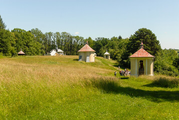 Fototapeta na wymiar A chapel surrounded by fields and forests, Kalwaria Pacławska, Poland