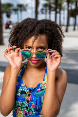 Woman posing with cool sunglasses