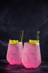 Refreshing pink drink or cocktail with ice