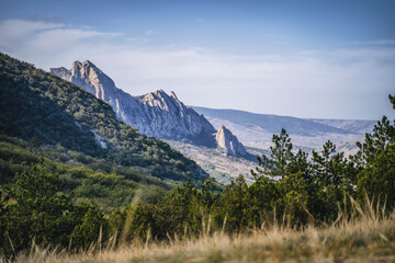 Fototapeta premium Journey to Mysterious part of majestic Karadag volcanic mountain range in Eastern Crimea, on a Black Sea shore