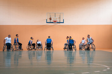 a photo of basketball teams with disabilities with the selector in the big hall before the start of the basketball game
