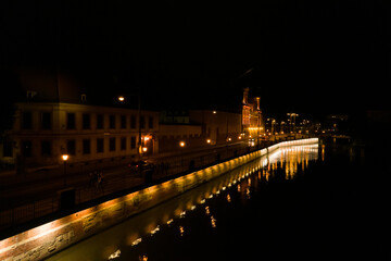 Fototapeta na wymiar Wrocław, a city in Poland at night. The night landscape of the city and the streets of Wrocław.