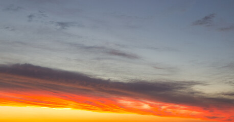 beautiful sunset on dramatic stormy red sky